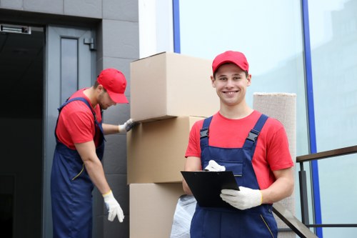 Removal team handling apartment move in Docklands