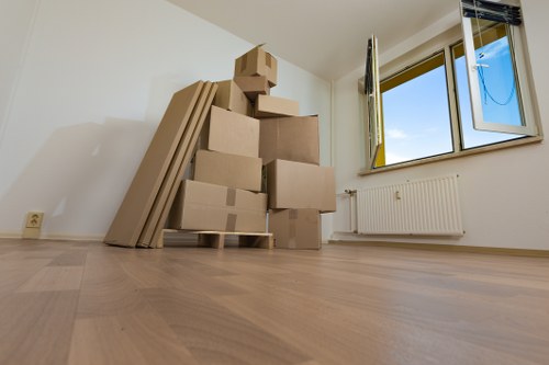 Removals team planning a Docklands apartment move with access considerations