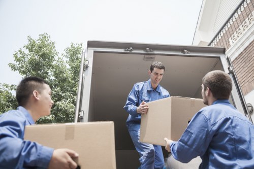 Selection of sturdy cardboard boxes and packing supplies for a Docklands move
