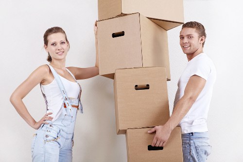 Unpacking support in a Docklands apartment with labelled boxes and organised rooms