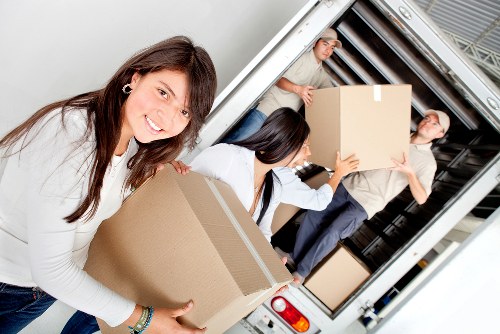 Careful furniture removal in a Docklands high-rise setting