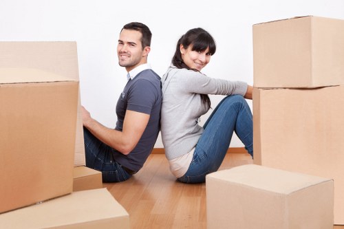 Local Docklands movers loading household items for a same day relocation