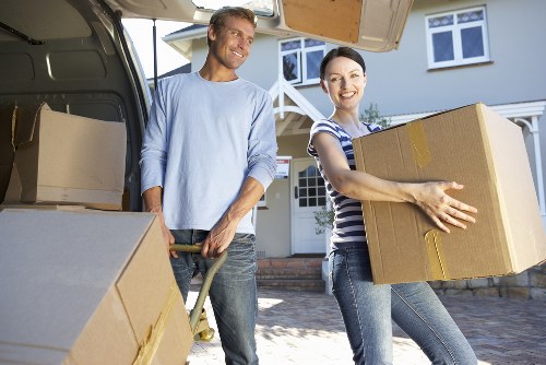 Professional packing service preparing fragile household items in Docklands